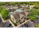 Beautiful aerial view of condos with pond, fountain, and pool in a landscaped community at 10154 Regent Square Dr # 201, Orlando, FL 32825