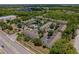 Discover condos with lush landscaping, a tranquil pond and community pool from above at 10154 Regent Square Dr # 201, Orlando, FL 32825