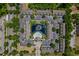 Aerial view of apartment community with pool, water feature, and parking at 10154 Regent Square Dr # 201, Orlando, FL 32825