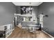 Chic dining area featuring a modern table and seamless connection to the open kitchen at 10154 Regent Square Dr # 201, Orlando, FL 32825