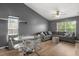 Inviting living room featuring a sofa and dining area, perfect for relaxing and entertaining at 10154 Regent Square Dr # 201, Orlando, FL 32825