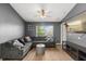 Comfortable living room with a large sectional sofa and modern decor at 10154 Regent Square Dr # 201, Orlando, FL 32825