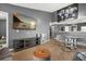 Inviting living space featuring a stylish dining area, media center, and entertainment setup at 10154 Regent Square Dr # 201, Orlando, FL 32825