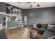 Open-concept living space combining a modern sofa with a sleek dining area and open kitchen at 10154 Regent Square Dr # 201, Orlando, FL 32825