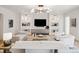 Bright living room featuring stylish furnishings, a decorative chandelier, and neutral tones for a relaxing ambiance at 10339 Kensington Shore Dr # J-202, Orlando, FL 32827