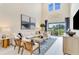 Comfortable living room with stylish furniture, decor, and a serene view at 1042 Teal Creek Dr, St Cloud, FL 34771