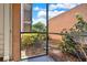 The screened in porch offers a view to the grounds of the complex at 109 Oyster Bay Cir # 150, Altamonte Springs, FL 32701