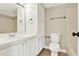 This bathroom features all white fixtures, a built in cabinet and drawers, and a neutral wall color at 109 Oyster Bay Cir # 150, Altamonte Springs, FL 32701
