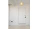 Close-up of front door with modern features and hardware at 1135 Marni Ridge Ct, Kissimmee, FL 34747
