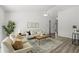 Spacious living room with comfortable seating, stylish decor, and ample natural light at 1135 Marni Ridge Ct, Kissimmee, FL 34747