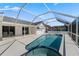 Enclosed pool and spa with backyard views and patio area at 1135 Marni Ridge Ct, Kissimmee, FL 34747