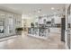 Bright kitchen with large island, custom cabinetry, and plenty of counter space at 11725 Verrazano Dr, Orlando, FL 32836