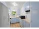 Well-lit kitchen featuring modern appliances and abundant storage, perfect for culinary enthusiasts at 1207 Cole Rd, Orlando, FL 32803