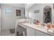 Well-lit bathroom with functional features and ample counter space, offering comfort and convenience at 122 Oak View Pl, Sanford, FL 32773