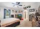 Comfortable bedroom with natural light, offering a peaceful retreat with easy access to the pool at 122 Oak View Pl, Sanford, FL 32773