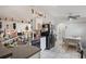 Functional kitchen with appliances and ample counter space, seamlessly connected to the dining area at 122 Oak View Pl, Sanford, FL 32773