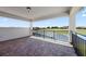 Balcony overlooking a lake and golf course at 13090 Bromborough Dr, Orlando, FL 32832