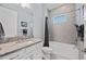 Bathroom featuring a granite countertop, a single sink and a shower and bath combo at 13090 Bromborough Dr, Orlando, FL 32832