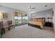 Primary bedroom with access to a patio at 13090 Bromborough Dr, Orlando, FL 32832