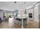 Kitchen featuring stainless steel appliances, a large island, recessed lighting, and an open floorplan at 13090 Bromborough Dr, Orlando, FL 32832