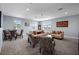 Open floorplan living area with a sitting and dining area at 13090 Bromborough Dr, Orlando, FL 32832