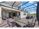 Spacious outdoor patio perfect for dining and relaxing with a scenic lake view at 13090 Bromborough Dr, Orlando, FL 32832