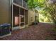 The exterior shows a screened porch with lush foliage at 133 Reserve Cir # 109, Oviedo, FL 32765