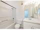 Clean bathroom features a vanity, a mirror, and a shower-tub combination at 133 Reserve Cir # 109, Oviedo, FL 32765