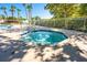 Relaxing hot tub offers an inviting space for unwinding surrounded by leafy greens and open skies at 133 Reserve Cir # 109, Oviedo, FL 32765
