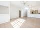 Open concept living room with tile floors and access to kitchen and bathroom at 133 Reserve Cir # 109, Oviedo, FL 32765