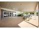 Covered outdoor patio provides ample seating and dining space, ideal for gatherings and relaxation at 133 Reserve Cir # 109, Oviedo, FL 32765