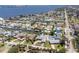 Wide angle aerial shot of the property and neighborhood featuring waterfront views, canals and pools at 151 Sea Isle Cir, South Daytona, FL 32119