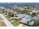 This waterfront property boasts lush landscaping and a convenient boat lift for easy access to the water at 151 Sea Isle Cir, South Daytona, FL 32119