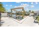 A large boat lift and entertaining area for enjoying this home's prime waterfront location at 151 Sea Isle Cir, South Daytona, FL 32119