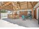 Spacious outdoor bar area, perfect for entertaining and relaxation near the pool at 151 Sea Isle Cir, South Daytona, FL 32119