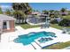 Overhead view of the in-ground pool, spa and patio area with easy access to the waterfront canal at 151 Sea Isle Cir, South Daytona, FL 32119