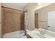 Bathroom with vanity, shower, and tile, providing a clean and functional space for daily routines at 1516 Resolute St, Celebration, FL 34747