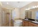 The main bathroom features double sinks, a walk-in shower and a garden tub for relaxation at 1516 Resolute St, Celebration, FL 34747