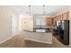 Well-equipped kitchen with granite countertops, stainless steel appliances, and ample cabinetry at 1516 Resolute St, Celebration, FL 34747