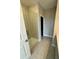 Walk-in shower with glass door in a bathroom with neutral tile flooring at 16290 Hamlin View St, Winter Garden, FL 34787