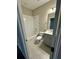 Bathroom featuring a shower and bath, vanity, and tile floors at 16290 Hamlin View St, Winter Garden, FL 34787