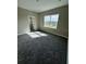 Bedroom with natural light, and a view of the community playground at 16290 Hamlin View St, Winter Garden, FL 34787