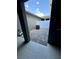 Outdoor patio space with brick flooring and partial fence at 16290 Hamlin View St, Winter Garden, FL 34787