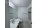 A well-lit bathroom features a toilet, a shower/tub combo, and a sink with a large mirror at 1908 Lake Atriums Cir # 20, Orlando, FL 32839