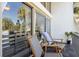 Balcony with seating overlooking the neighborhood, enhancing the property's outdoor living space at 200 Maitland Ave # 28, Altamonte Springs, FL 32701