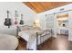Bedroom with vaulted wood ceiling, dark floors and ensuite bathroom access at 200 Maitland Ave # 28, Altamonte Springs, FL 32701