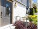 Charming home entrance with a landscaped yard and visible unit number at 200 Maitland Ave # 28, Altamonte Springs, FL 32701