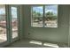 Unfinished room with door leading to a patio and a window with a construction view, awaiting personalization at 2389 Zuni Road, St Cloud, FL 34771