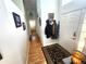 Inviting entryway with hardwood floors, decor, and natural light at 2426 Hybrid Dr, Kissimmee, FL 34758