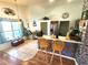 Inviting kitchen with breakfast bar, stainless steel appliances, and natural light at 2426 Hybrid Dr, Kissimmee, FL 34758